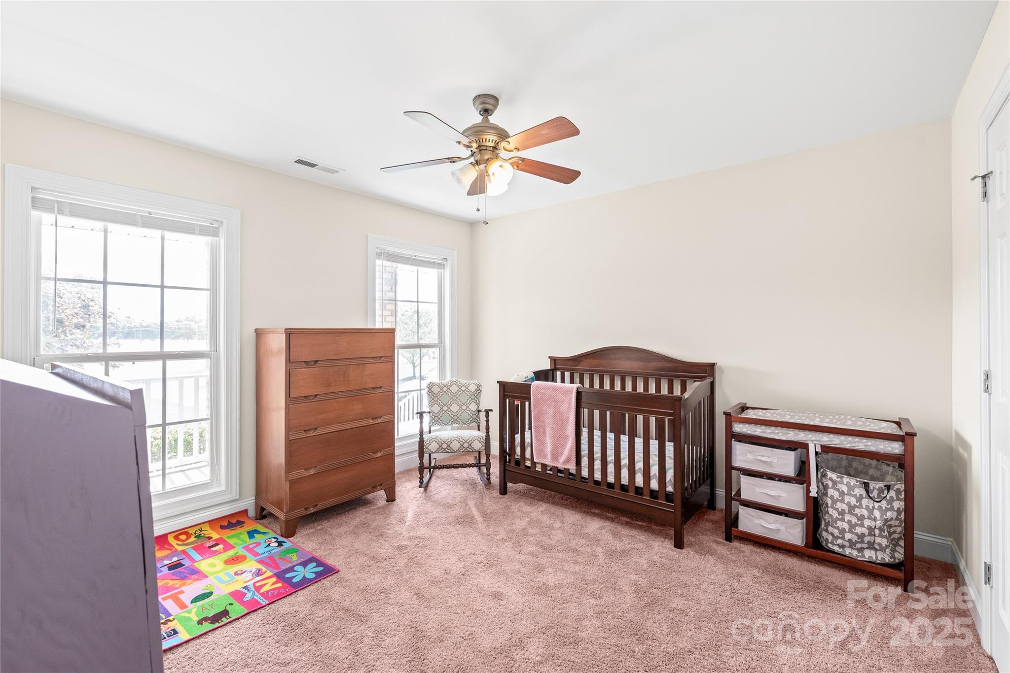 8717 Swift Road Oakboro, NC 28129 - Photo 12 of 23 a bedroom with furniture and a window