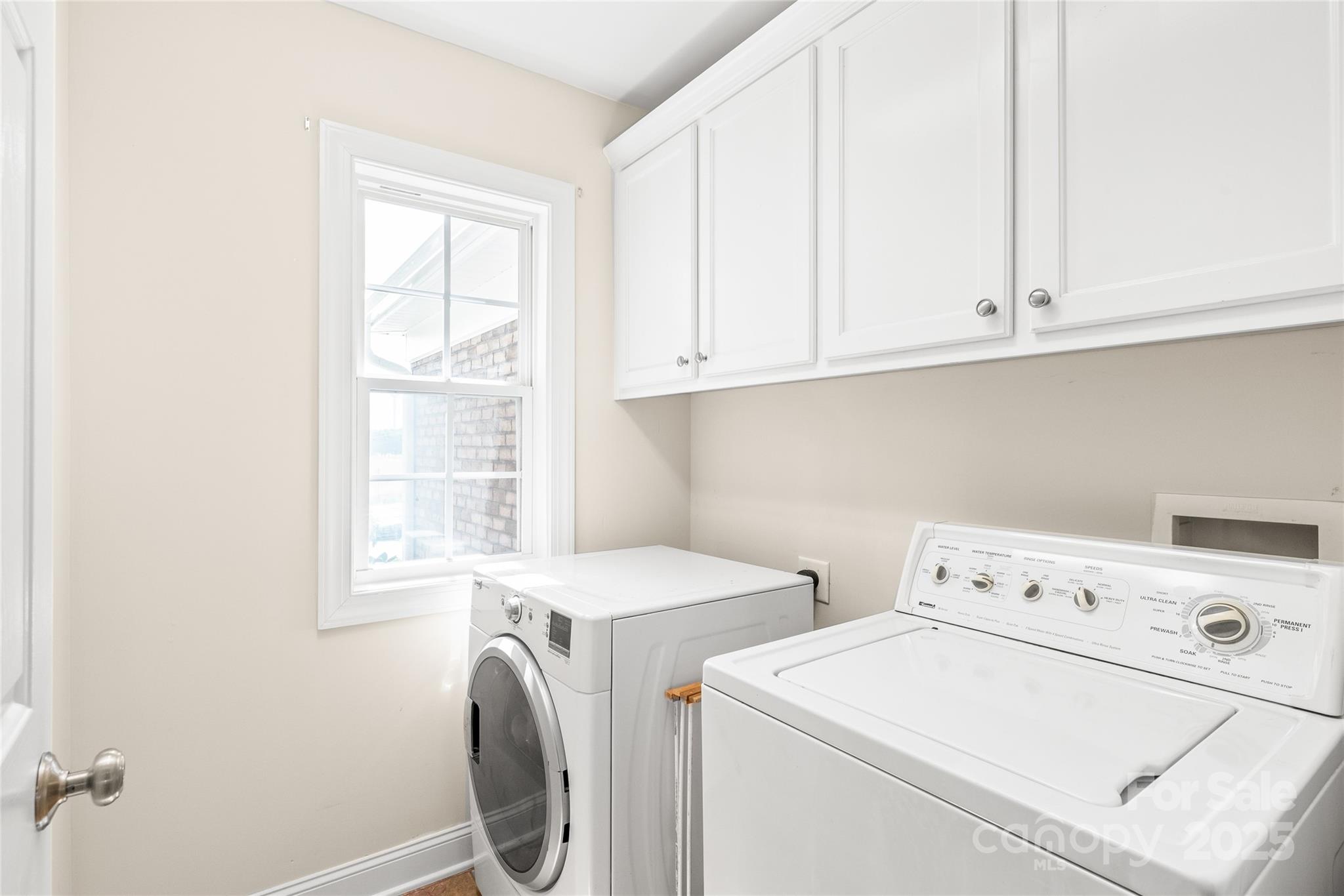 8717 Swift Road Oakboro, NC 28129 - Photo 16 of 23 a utility room with dryer and washer
