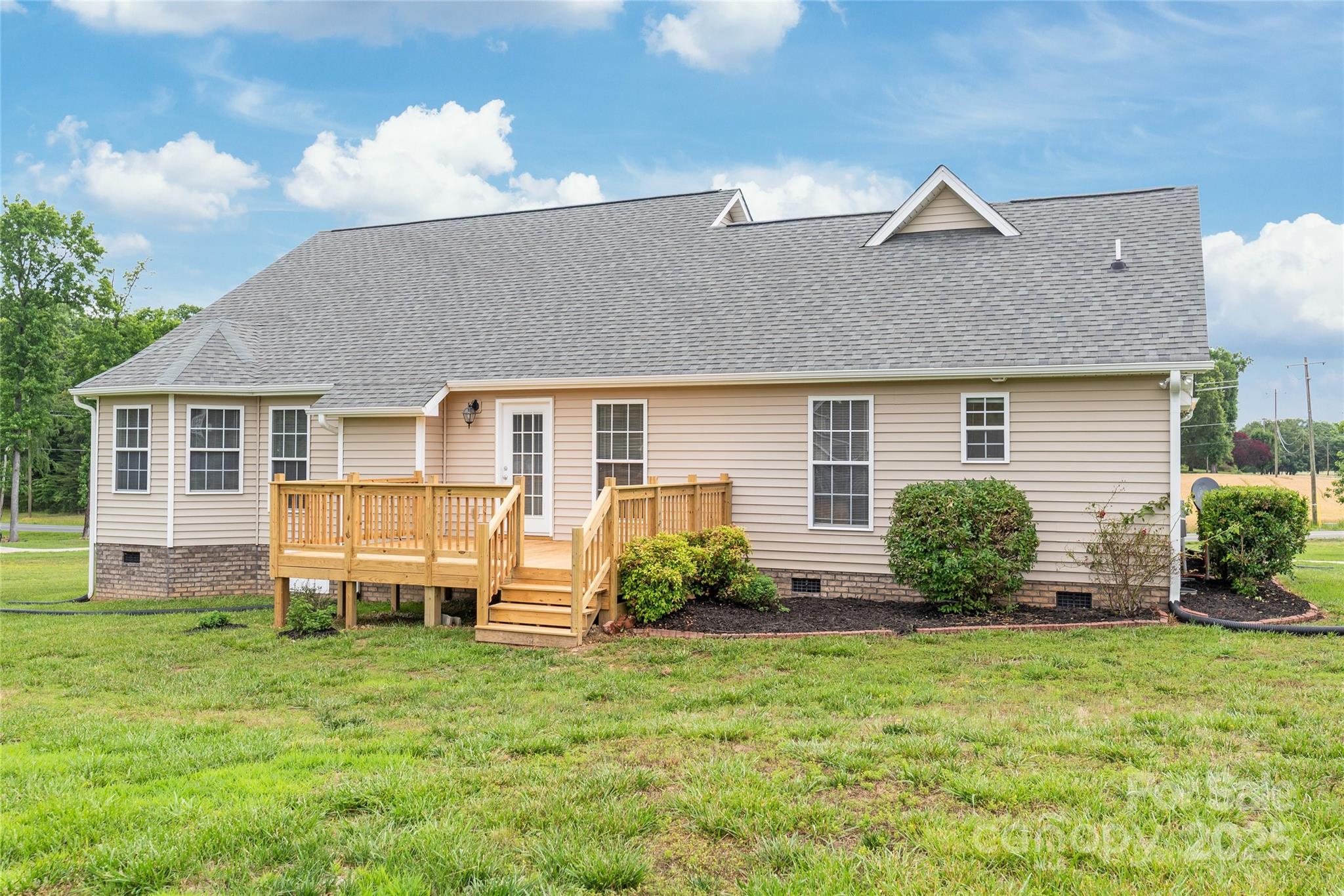 8717 Swift Road Oakboro, NC 28129 - Photo 19 of 23 front view of a house with a yard