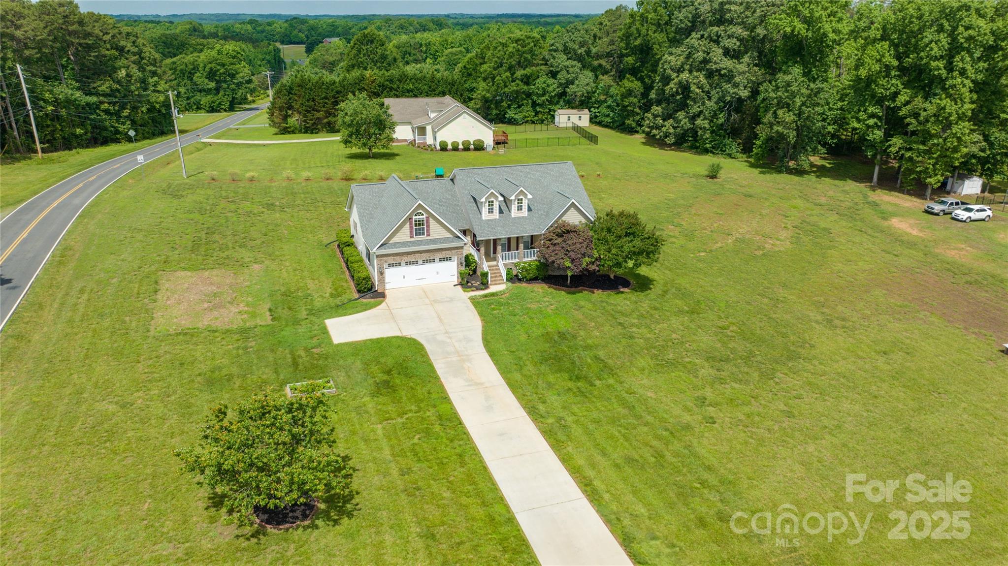 8717 Swift Road Oakboro, NC 28129 - Photo 22 of 23 a view of a golf course with chairs