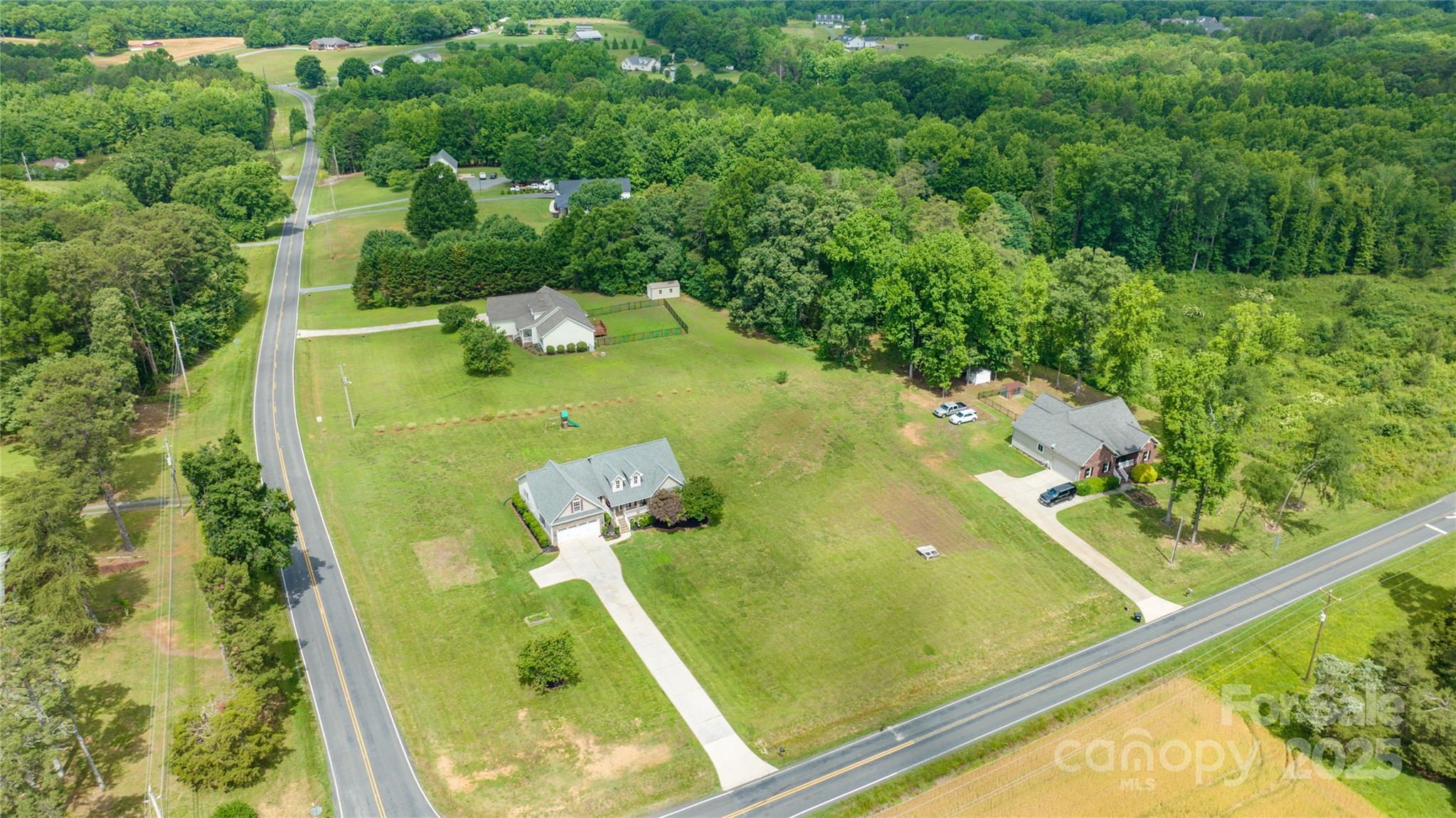 8717 Swift Road Oakboro, NC 28129 - Photo 23 of 23 a view of a swimming pool with a patio