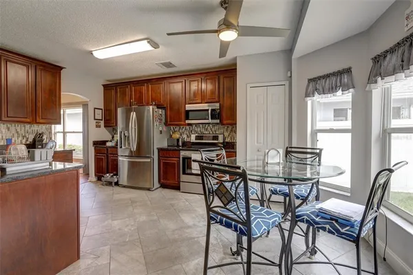 a view of a dining room with furniture