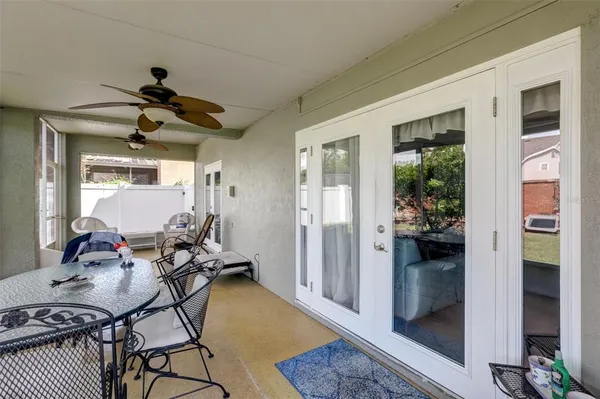 a view of a livingroom with furniture and front door