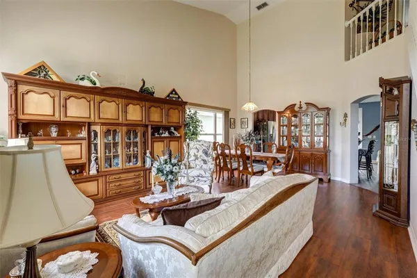 a view of a living room and dining room