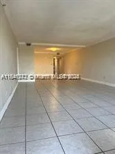 a view of a room with an empty space