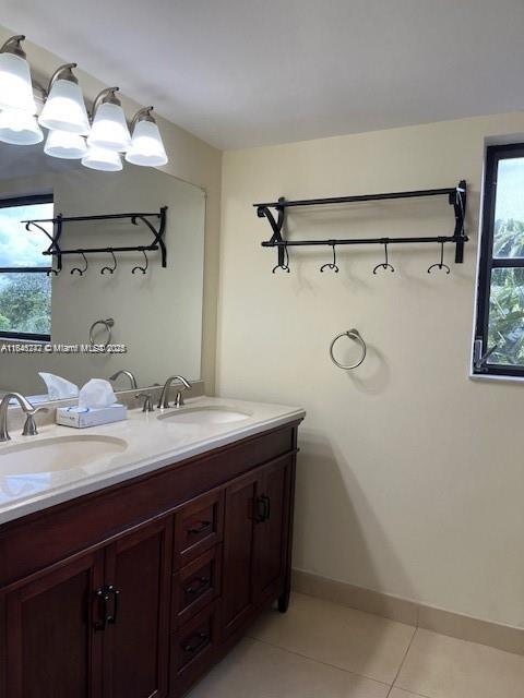 20850 San Simeon Way, Unit 3095 Miami, FL 33179 - Photo 5 of 20 a bathroom with a granite countertop sink mirror and double