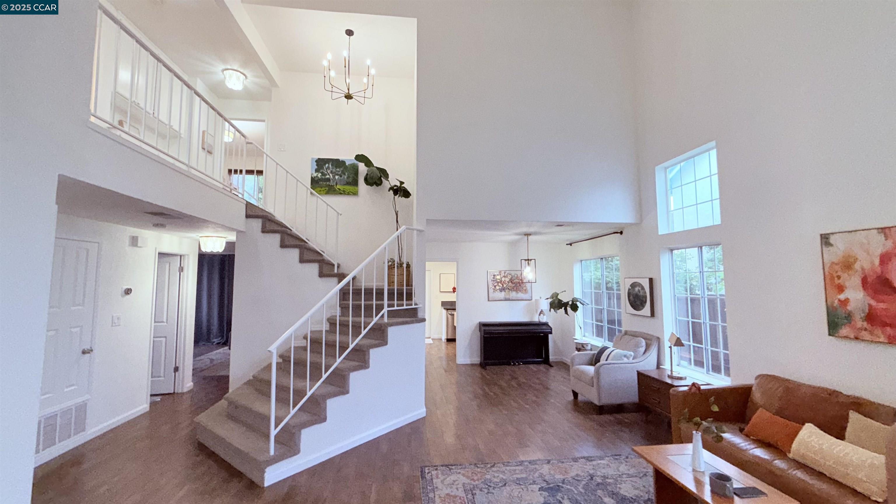 360 Gull Place Pittsburg, CA 94565 - Photo 13 of 36 a living room with furniture and stairs