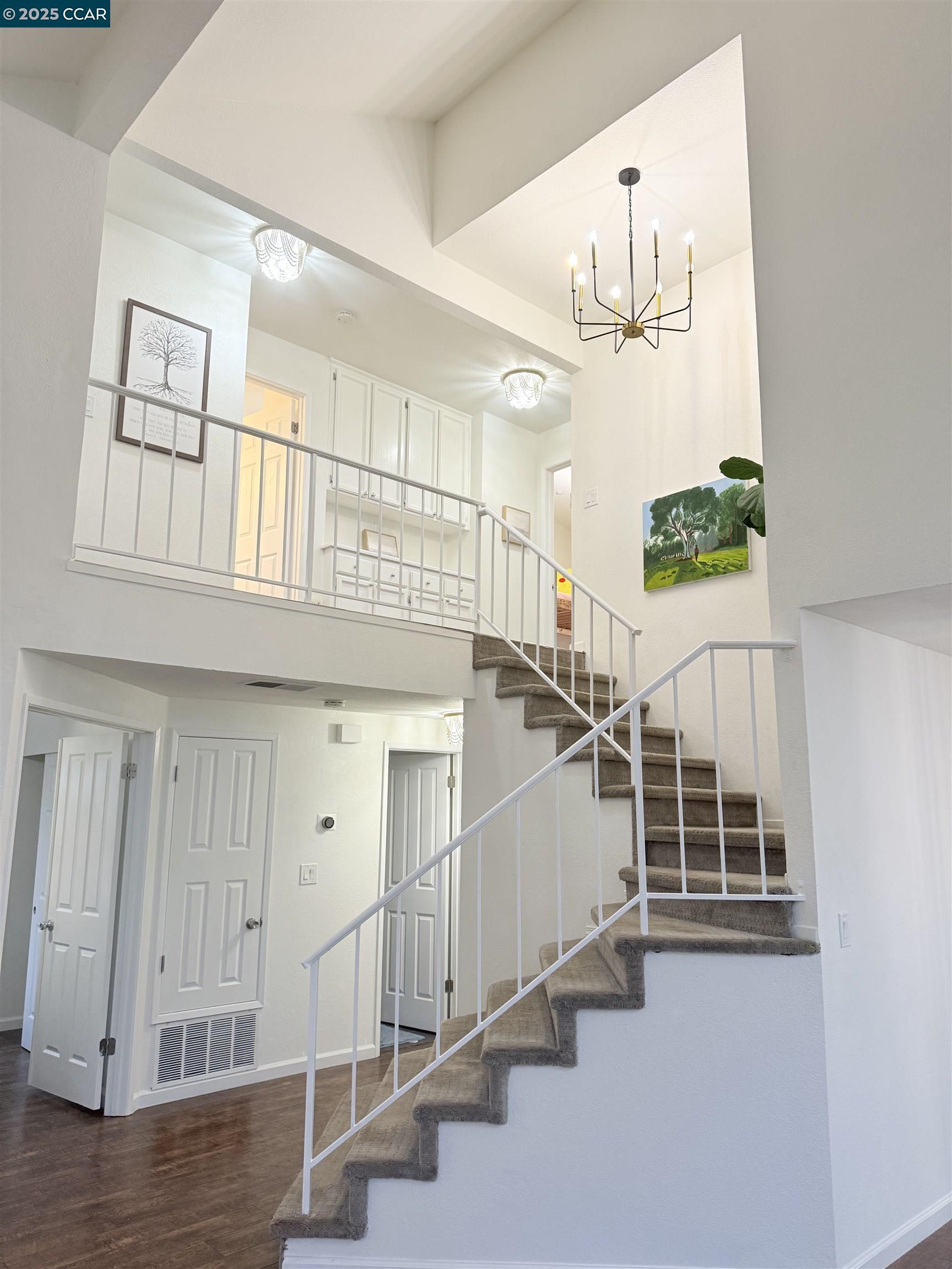 360 Gull Place Pittsburg, CA 94565 - Photo 14 of 36 a view of entryway and hall with wooden floor