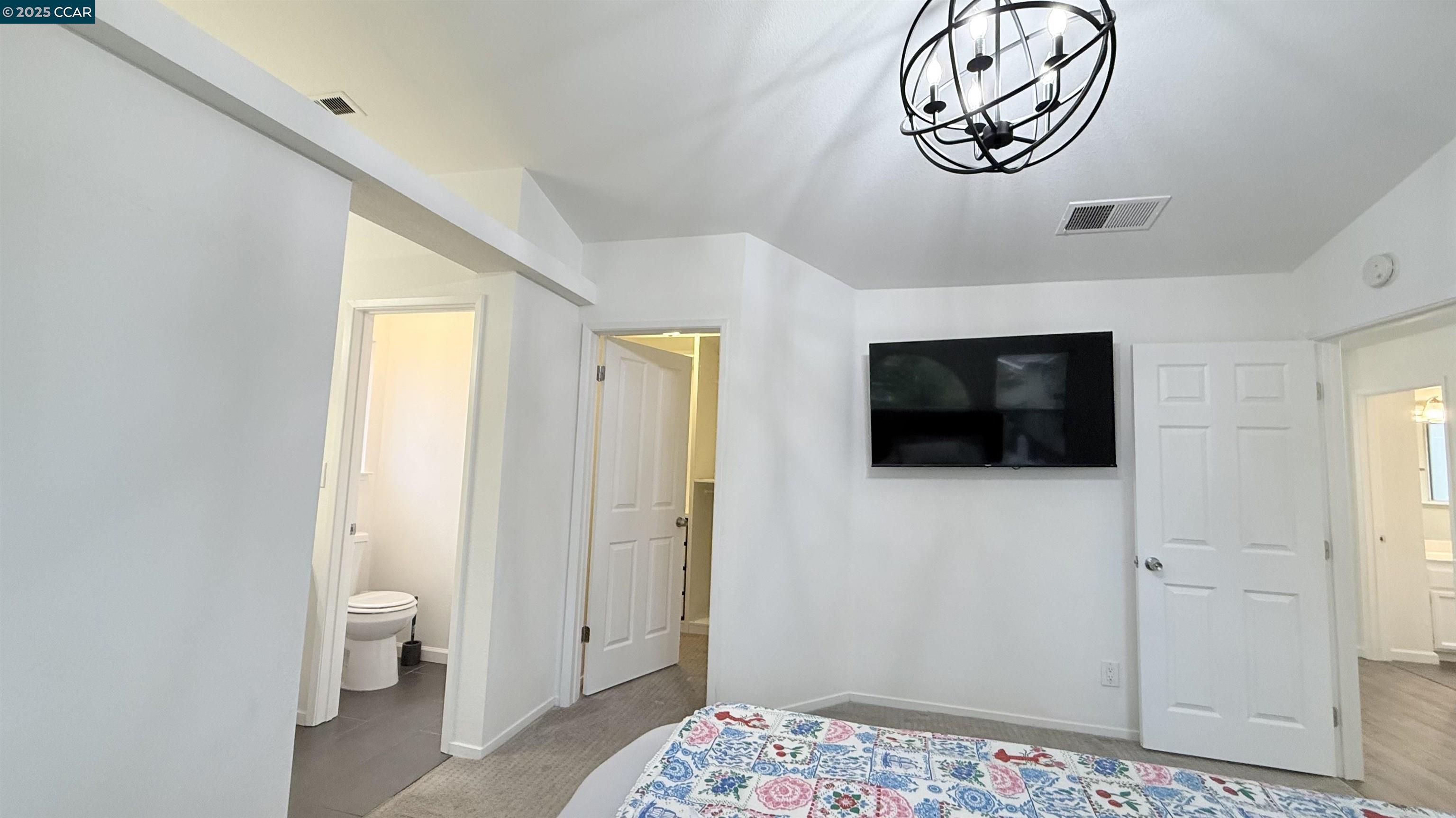 360 Gull Place Pittsburg, CA 94565 - Photo 20 of 36 a bedroom with a bed and a television