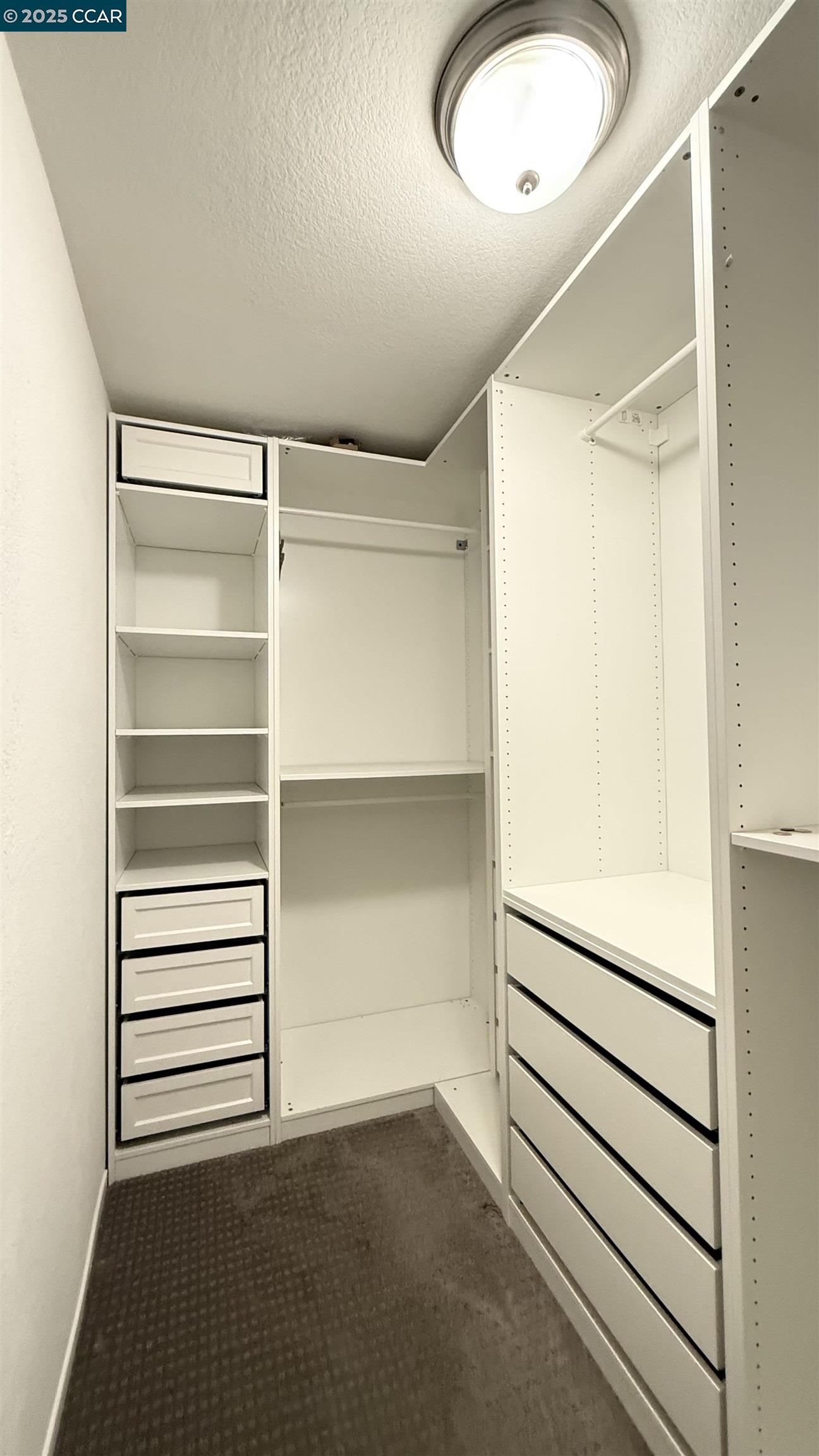 360 Gull Place Pittsburg, CA 94565 - Photo 21 of 36 a view of walk in closet with empty racks