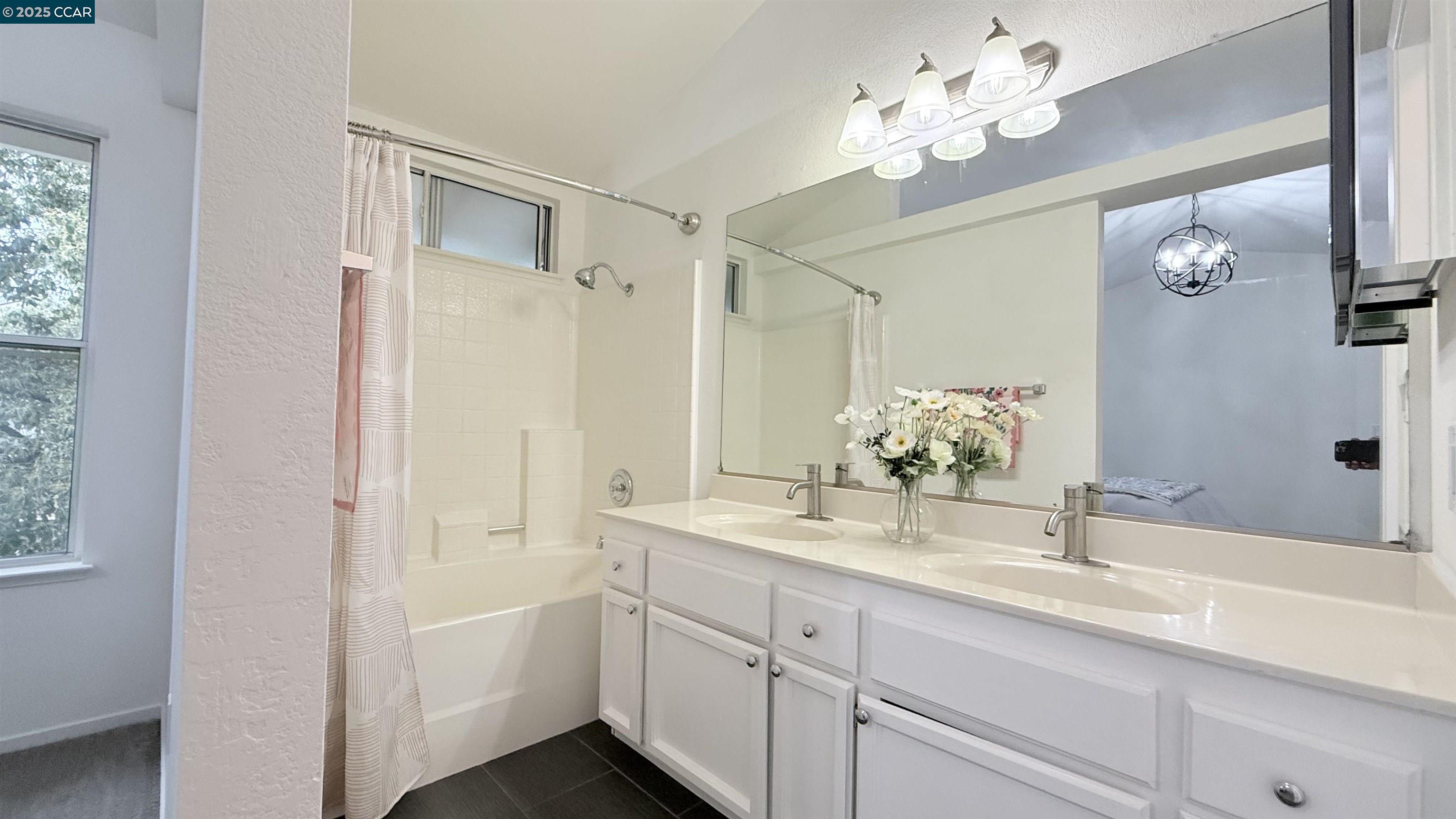360 Gull Place Pittsburg, CA 94565 - Photo 22 of 36 a bathroom with a sink double vanity and a mirror