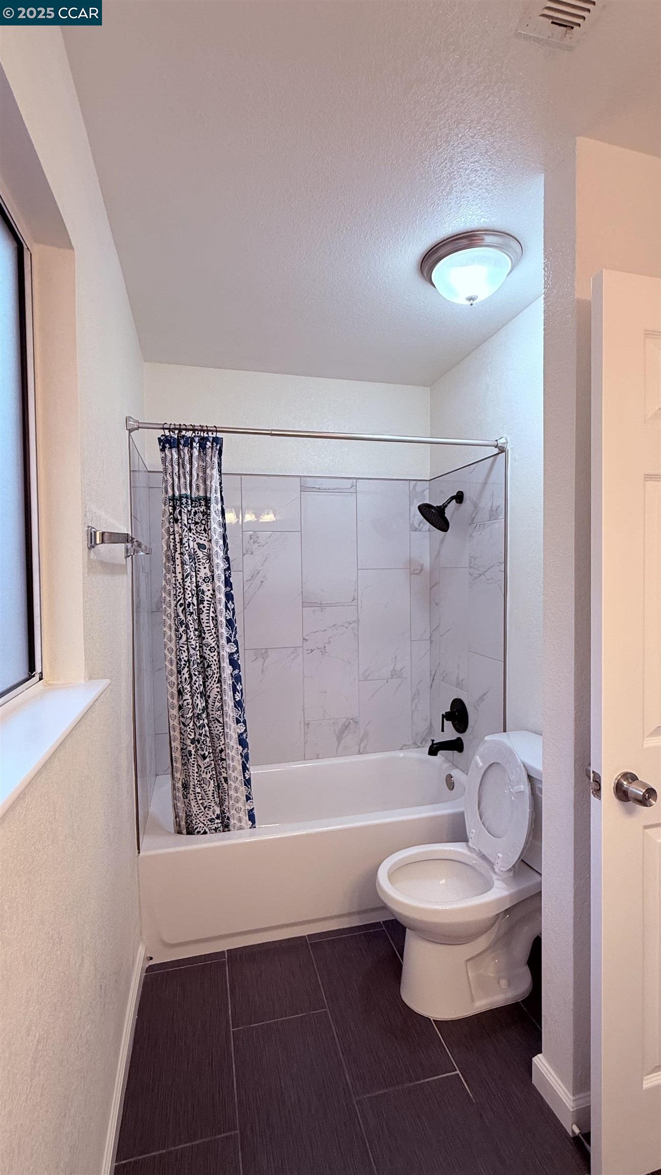 360 Gull Place Pittsburg, CA 94565 - Photo 28 of 36 a bathroom with a bathtub shower sink vanity and toilet