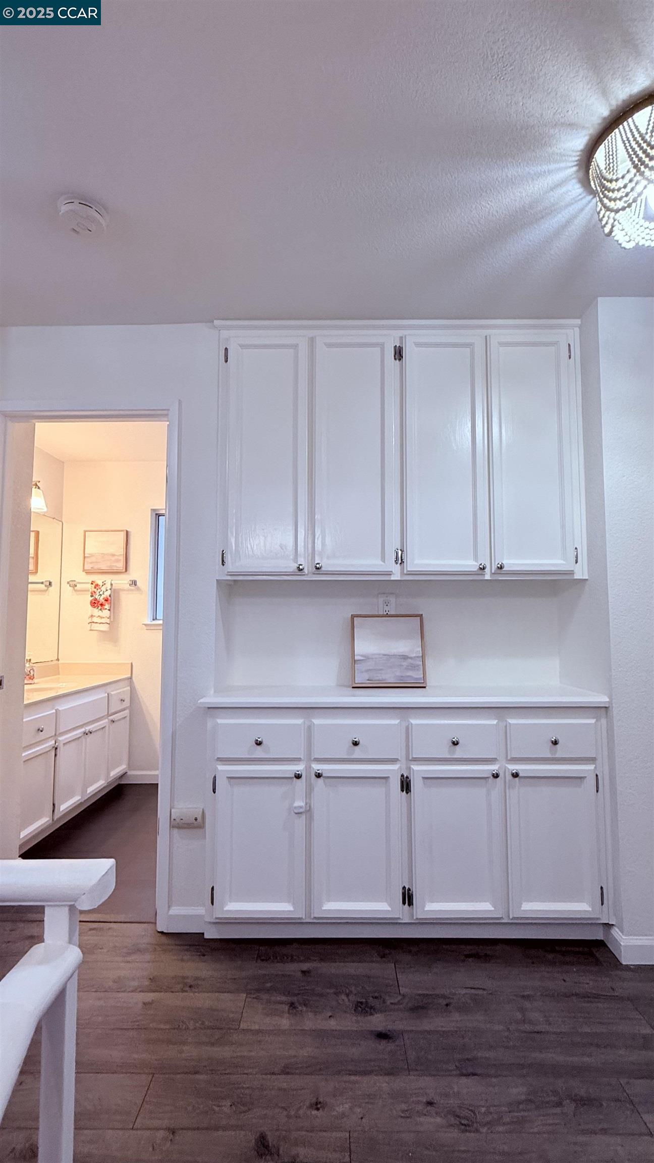 360 Gull Place Pittsburg, CA 94565 - Photo 29 of 36 a view of cabinets and wooden floor