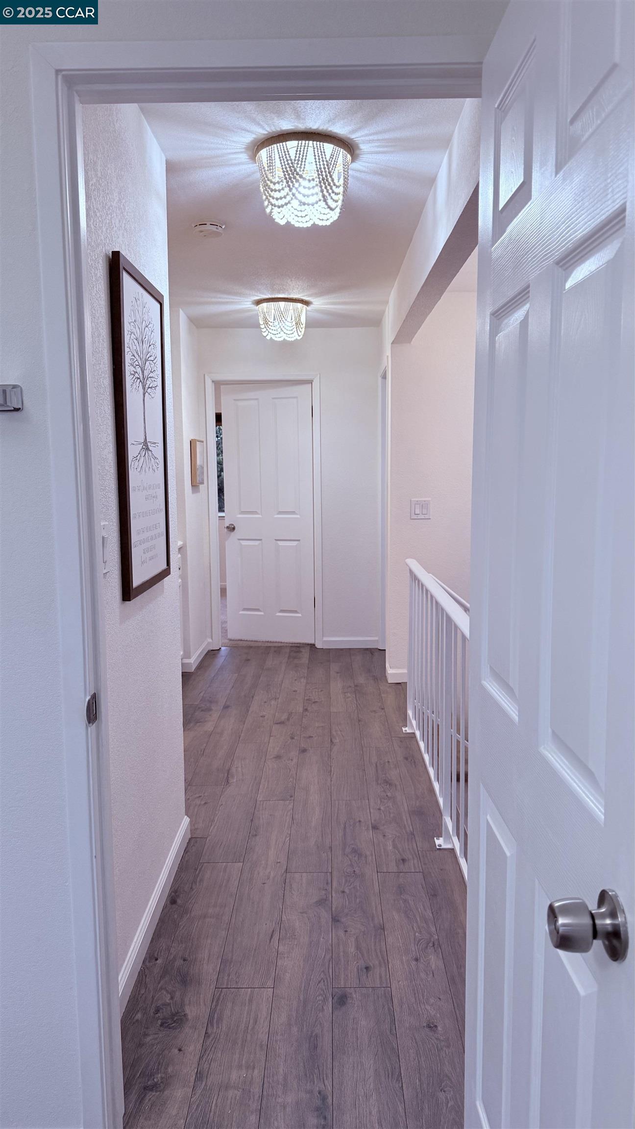 360 Gull Place Pittsburg, CA 94565 - Photo 31 of 36 a view of a hallway with wooden floor