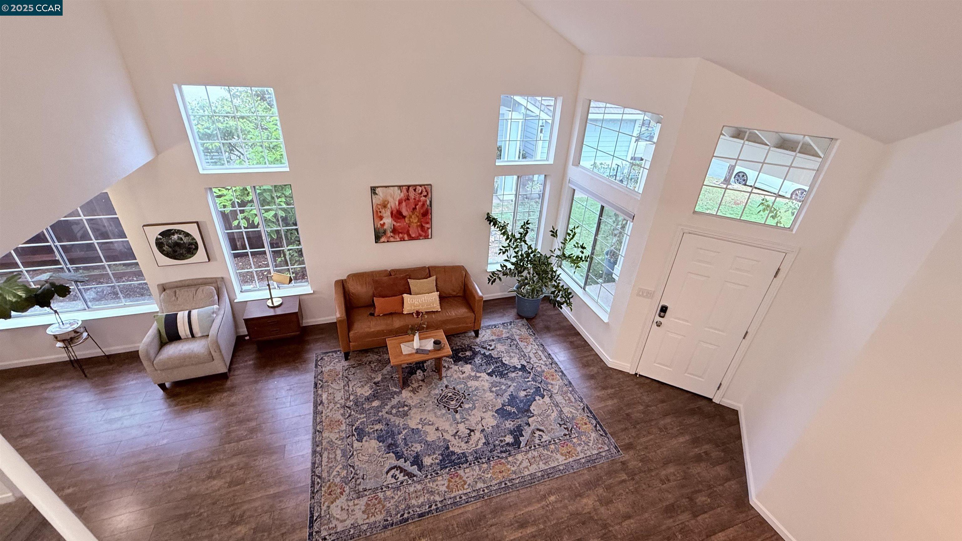 360 Gull Place Pittsburg, CA 94565 - Photo 32 of 36 a living room with furniture and a table