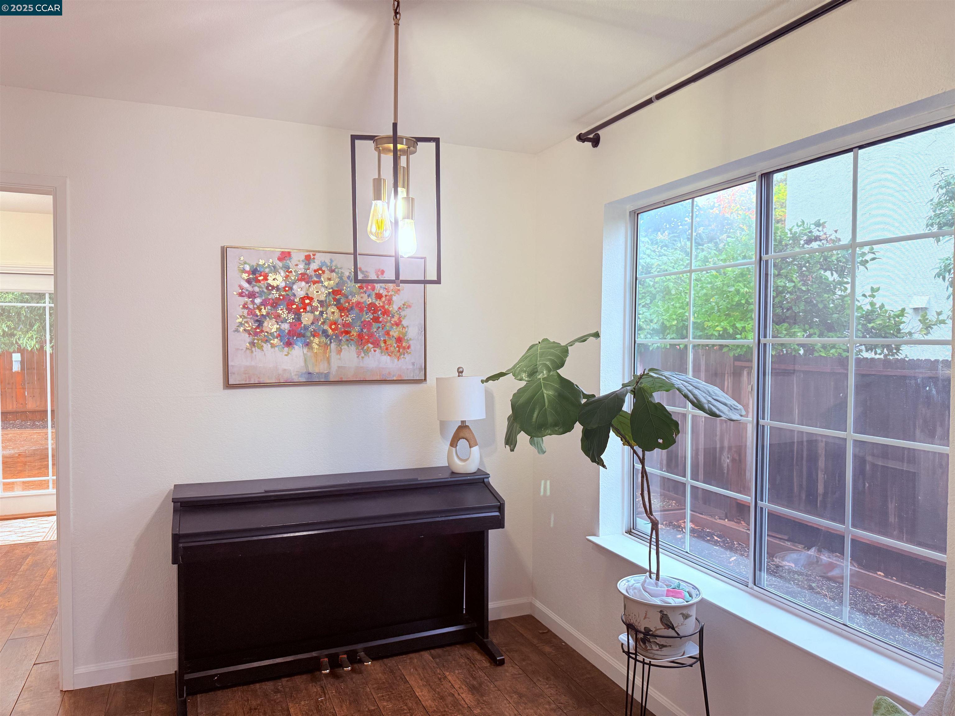 360 Gull Place Pittsburg, CA 94565 - Photo 4 of 36 a living room with furniture a potted plant and a large window