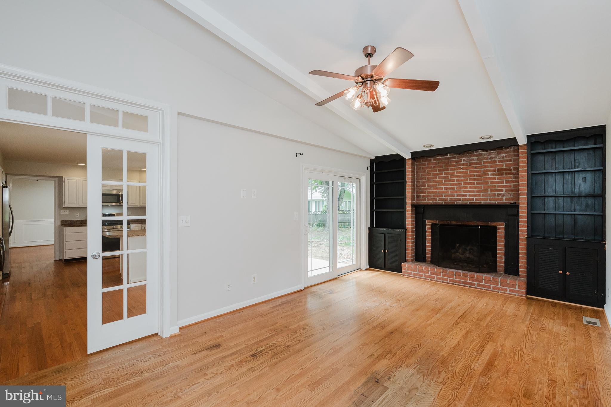4 Old Spring Court Cockeysville, MD 21030 - Photo 19 of 53 a view of a livingroom with a fireplace and window