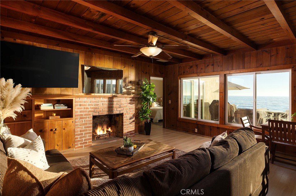 35711 Beach Road Dana Point, CA 92624 - Photo 11 of 47 a living room with furniture fireplace and flat screen tv