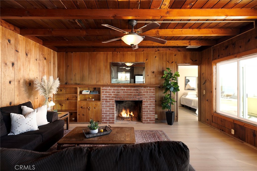 35711 Beach Road Dana Point, CA 92624 - Photo 16 of 47 a living room with furniture and a fireplace