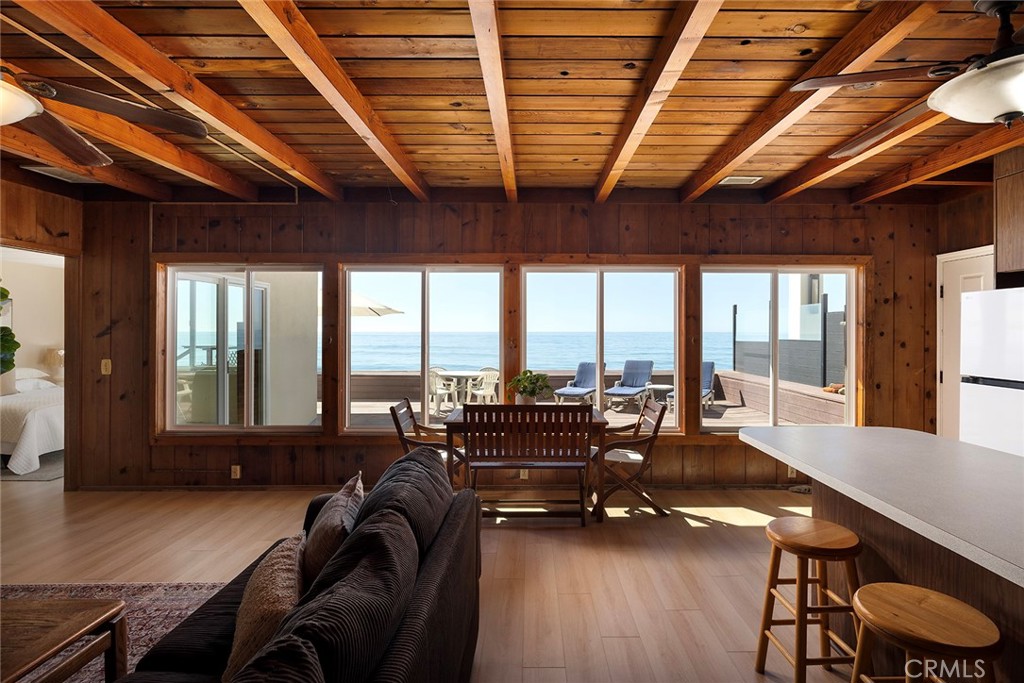 35711 Beach Road Dana Point, CA 92624 - Photo 17 of 47 a living room with furniture pool table and a large window