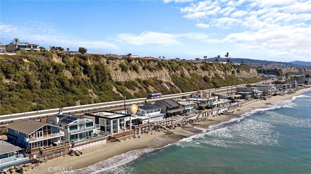 35711 Beach Road Dana Point, CA 92624 - Photo 39 of 47 a view of a swimming pool with a yard