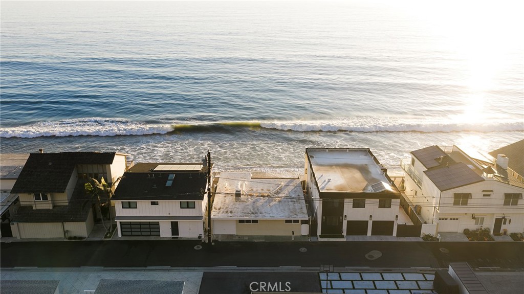 35711 Beach Road Dana Point, CA 92624 - Photo 10 of 47 a picture of a building with a couple of cars parked in parking lot