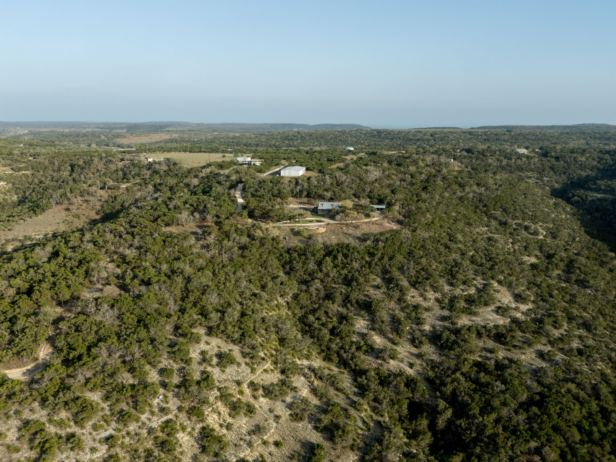 281 Kloster Lane Blanco, TX 78606 - Photo 40 of 40 an aerial view of residential houses with outdoor space