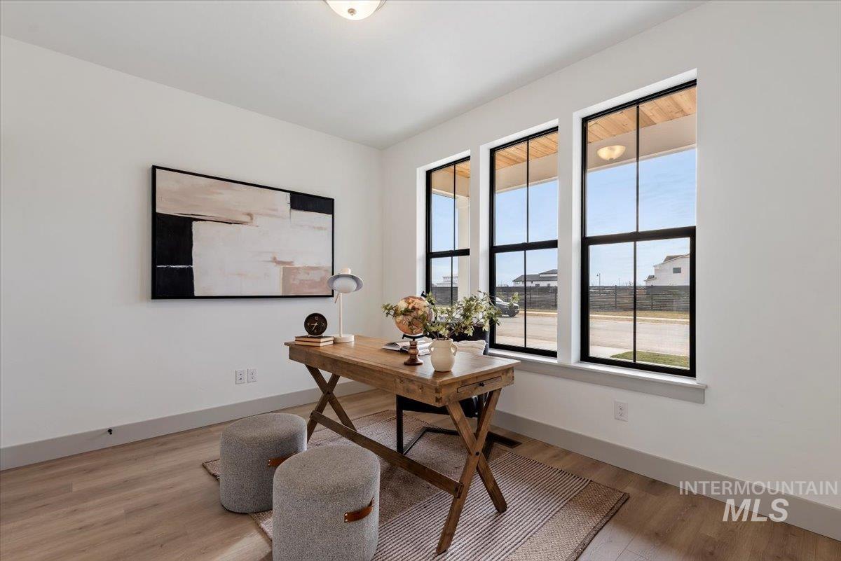 7624 West Old School Street, Unit FREMONT Meridian, ID 83646 - Photo 7 of 35 Office with light wood-type flooring and baseboards