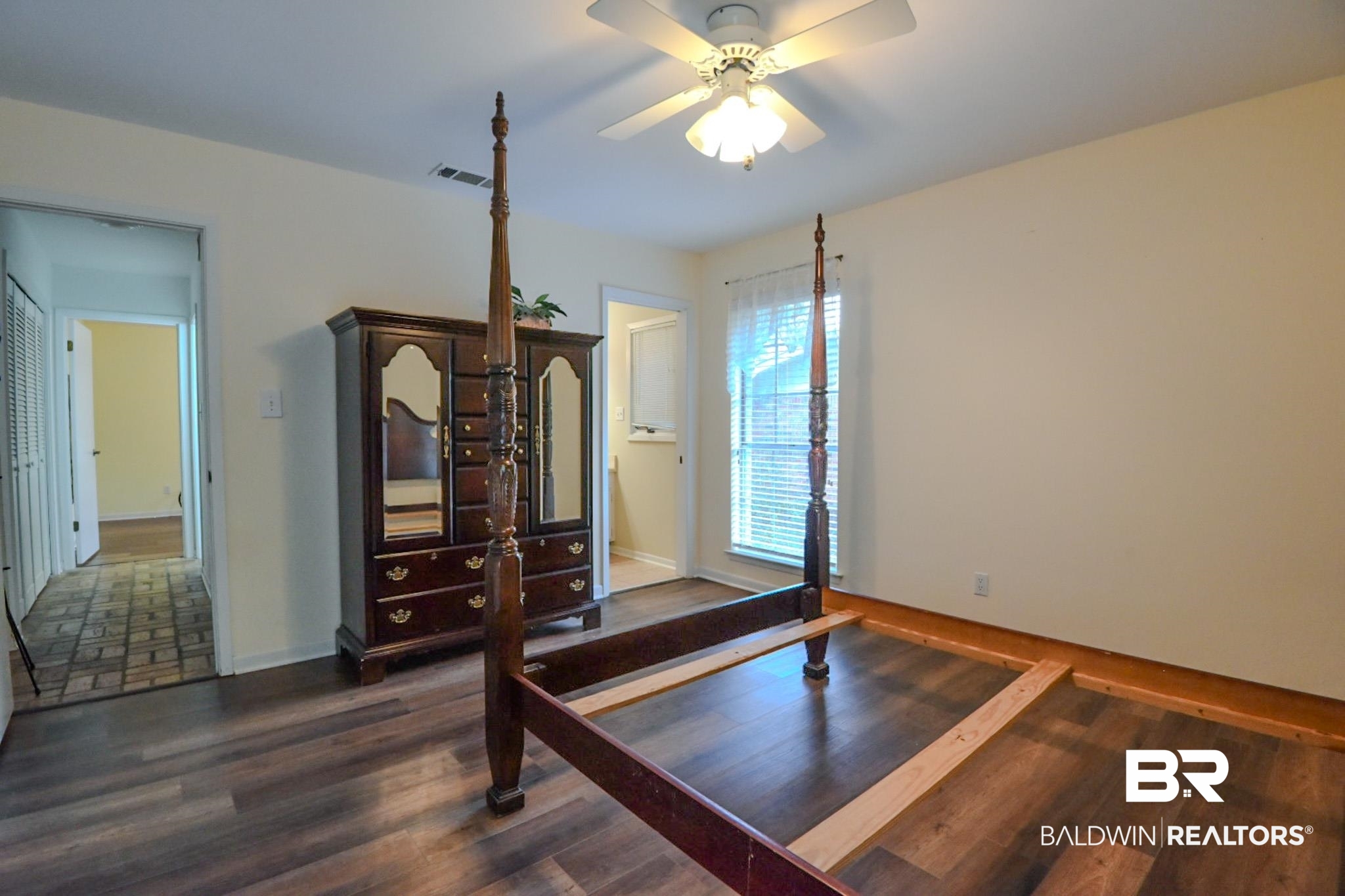 90 Paddock Drive Fairhope, AL 36532 - Photo 16 of 23 Bedroom featuring dark wood-style floors and a ceiling fan
