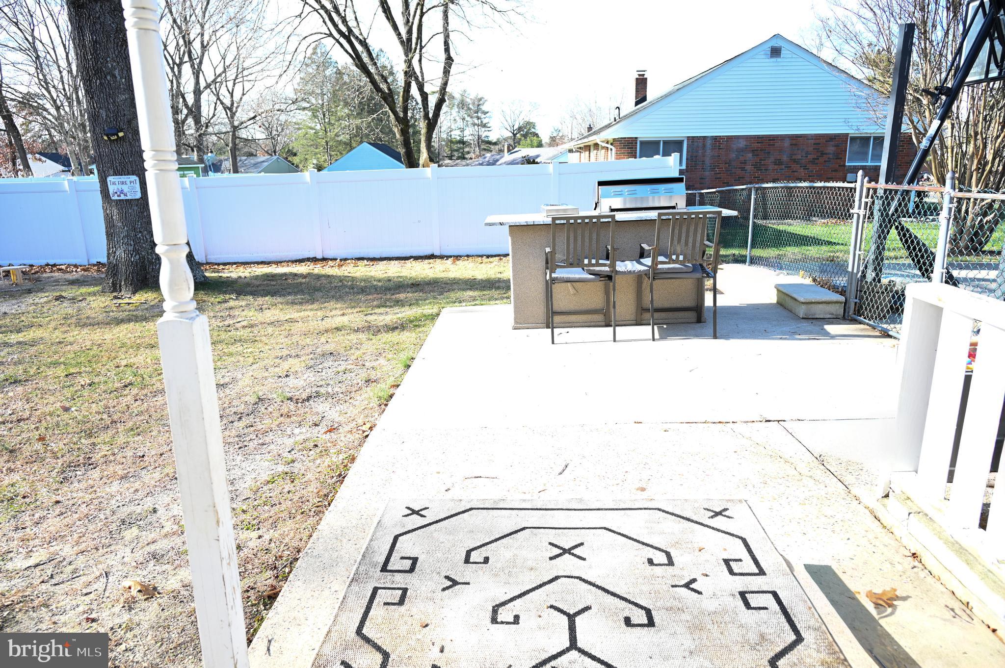 107 Robin Lane Voorhees, NJ 08043 - Photo 13 of 27 a view of a house with backyard and sitting area