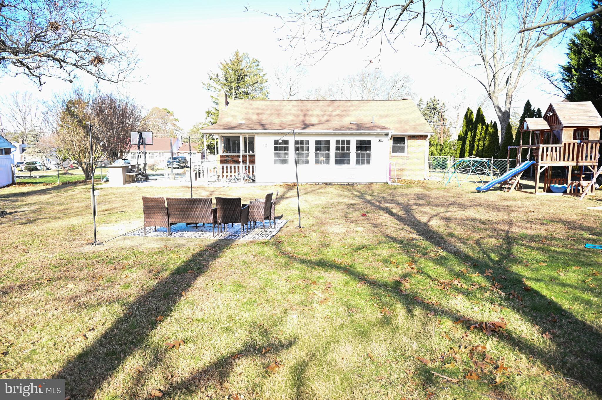 107 Robin Lane Voorhees, NJ 08043 - Photo 14 of 27 a view of a house with swimming pool