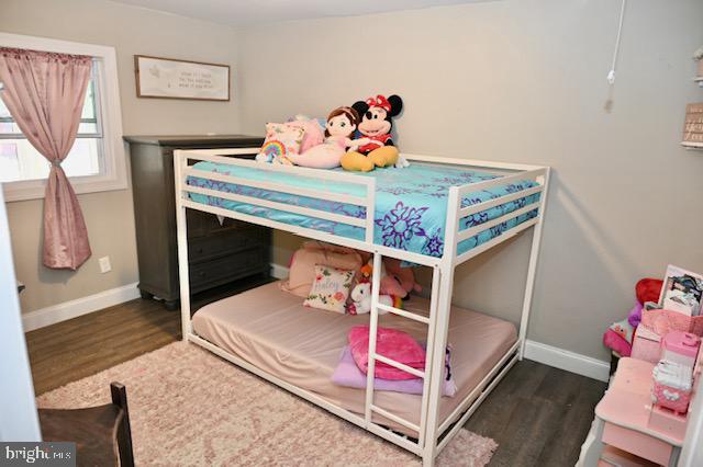 107 Robin Lane Voorhees, NJ 08043 - Photo 21 of 27 a bedroom with furniture and a baby crib