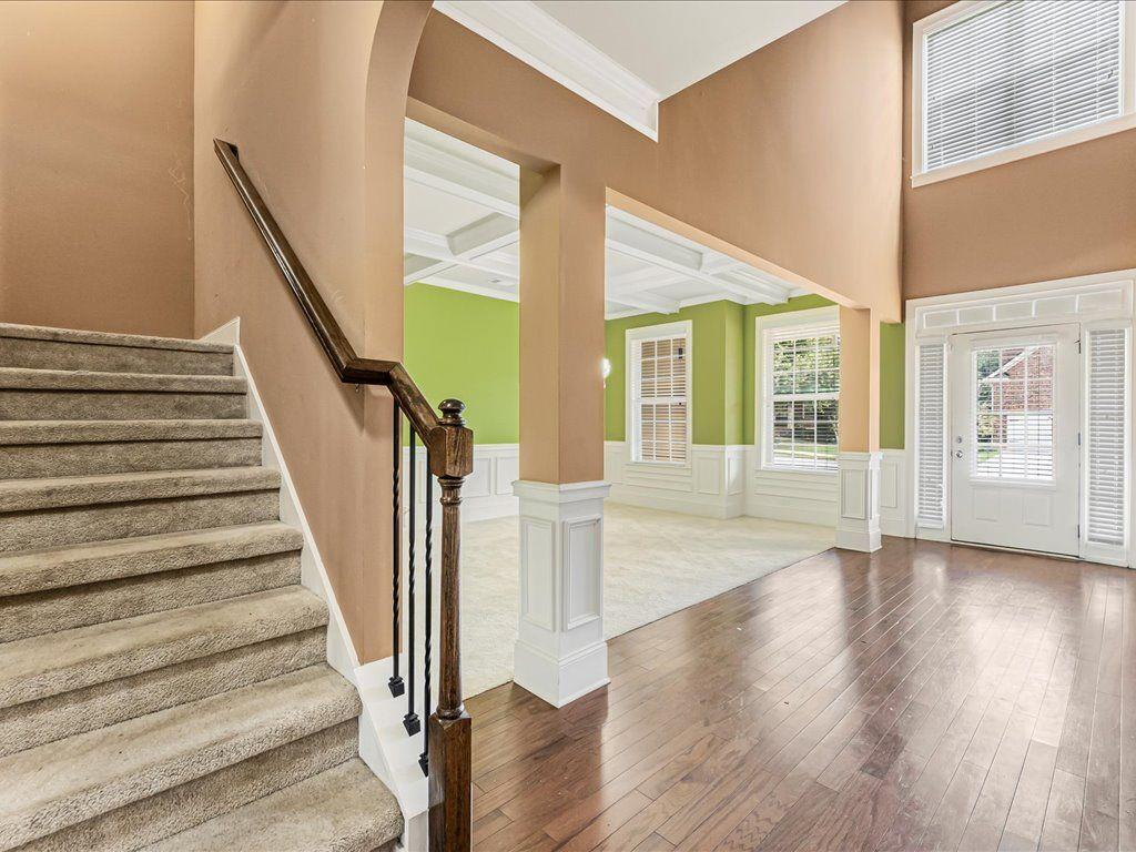 80 Lanier Ridge Acworth, GA 30101 - Photo 13 of 59 a view of an entryway with wooden floor and door