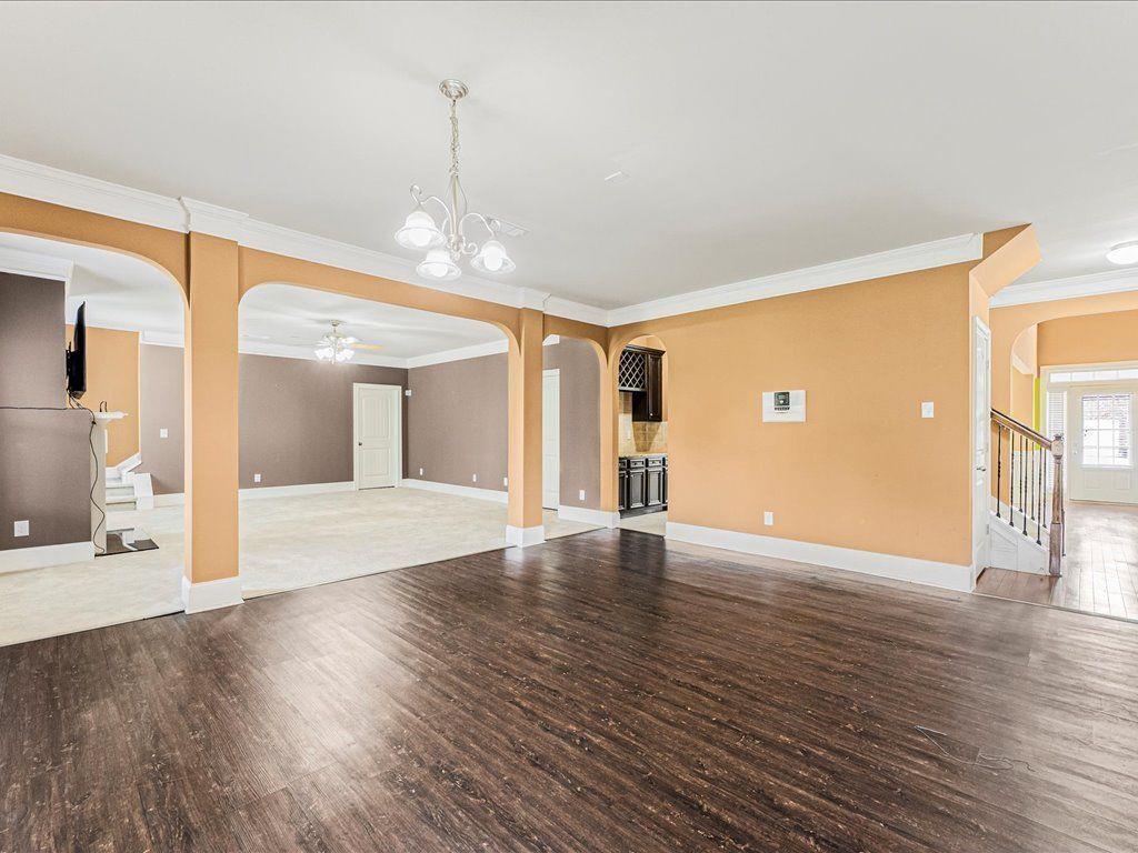 80 Lanier Ridge Acworth, GA 30101 - Photo 16 of 59 a view of an empty room with wooden floor and a window