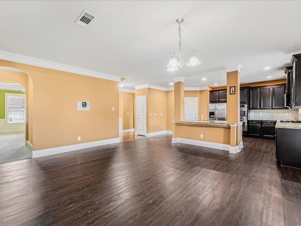 80 Lanier Ridge Acworth, GA 30101 - Photo 18 of 59 a view of a kitchen with wooden floor and a window