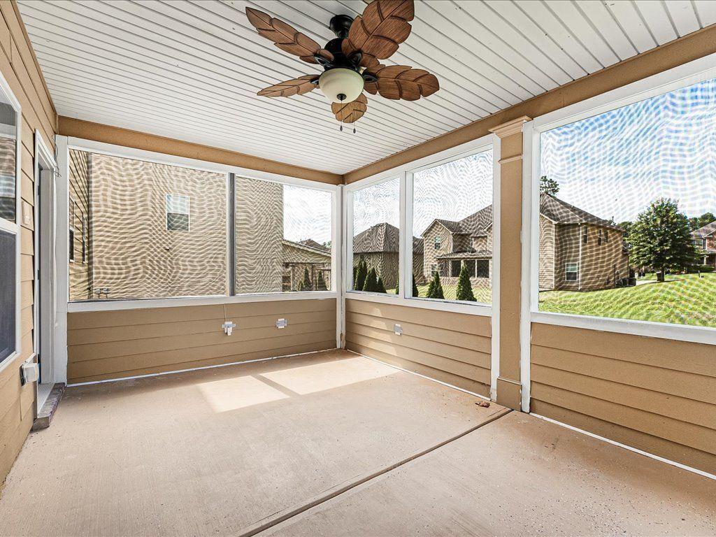 80 Lanier Ridge Acworth, GA 30101 - Photo 28 of 59 a view of an empty room with a fireplace and a large window