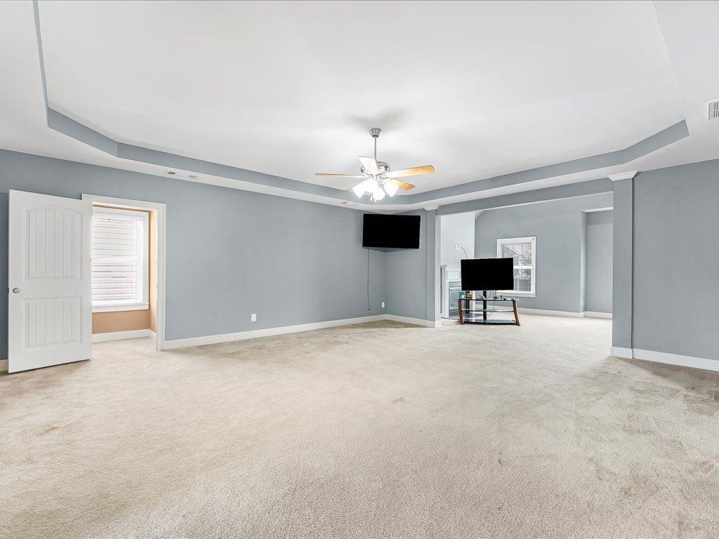 80 Lanier Ridge Acworth, GA 30101 - Photo 30 of 59 a view of empty room with a ceiling fan
