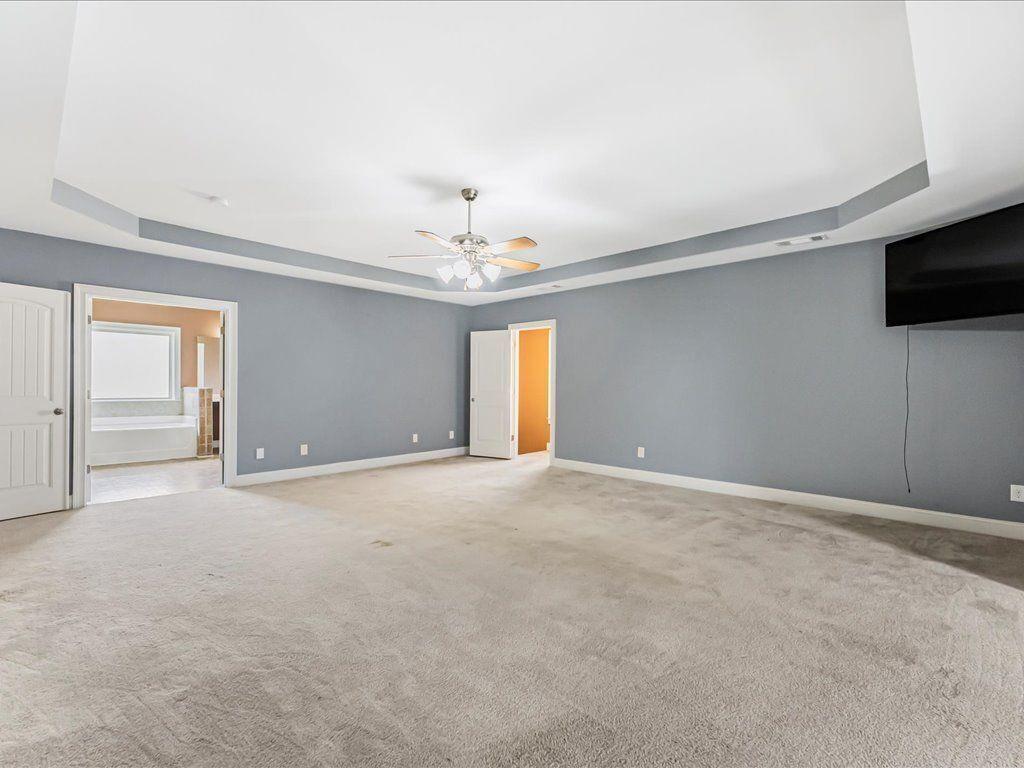 80 Lanier Ridge Acworth, GA 30101 - Photo 31 of 59 a view of an empty room with a window