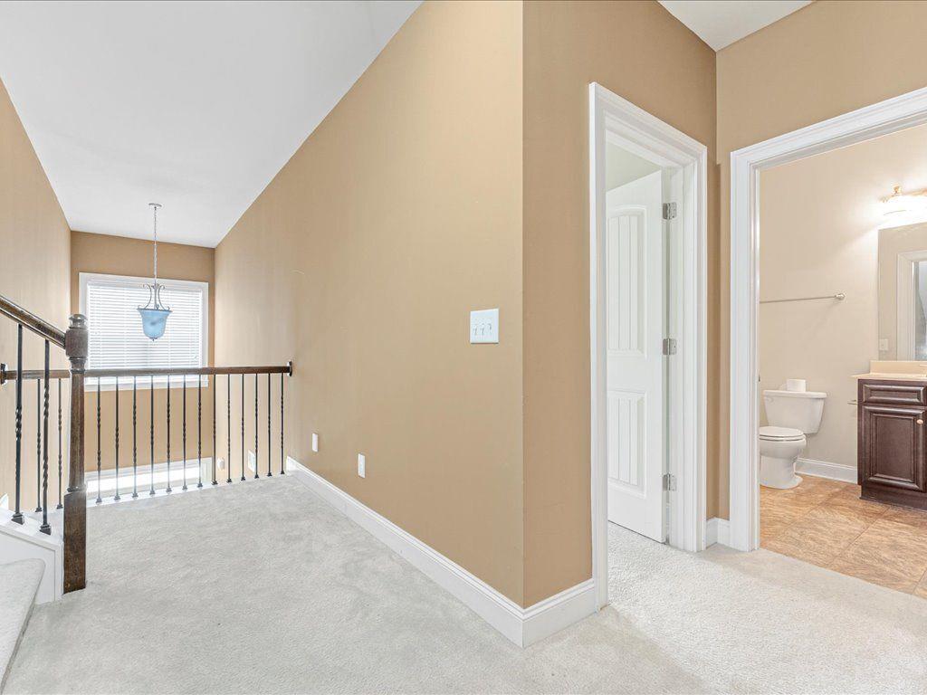 80 Lanier Ridge Acworth, GA 30101 - Photo 46 of 59 a view of a livingroom with entryway and stairs