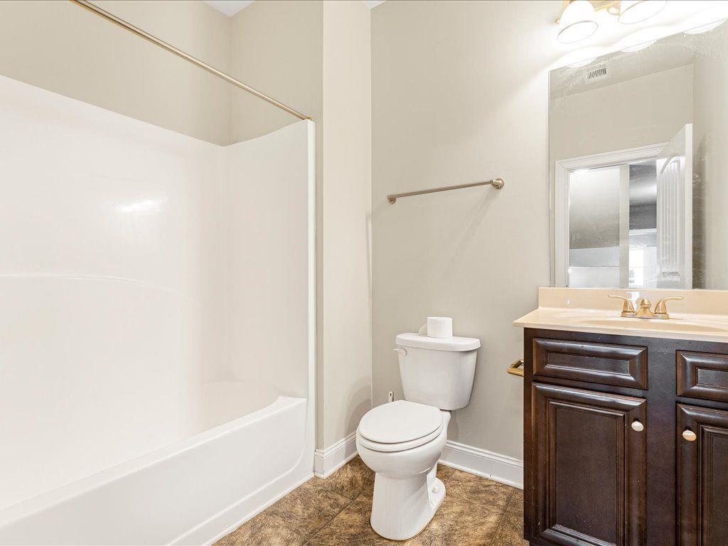 80 Lanier Ridge Acworth, GA 30101 - Photo 47 of 59 a bathroom with a toilet a sink and a bathtub