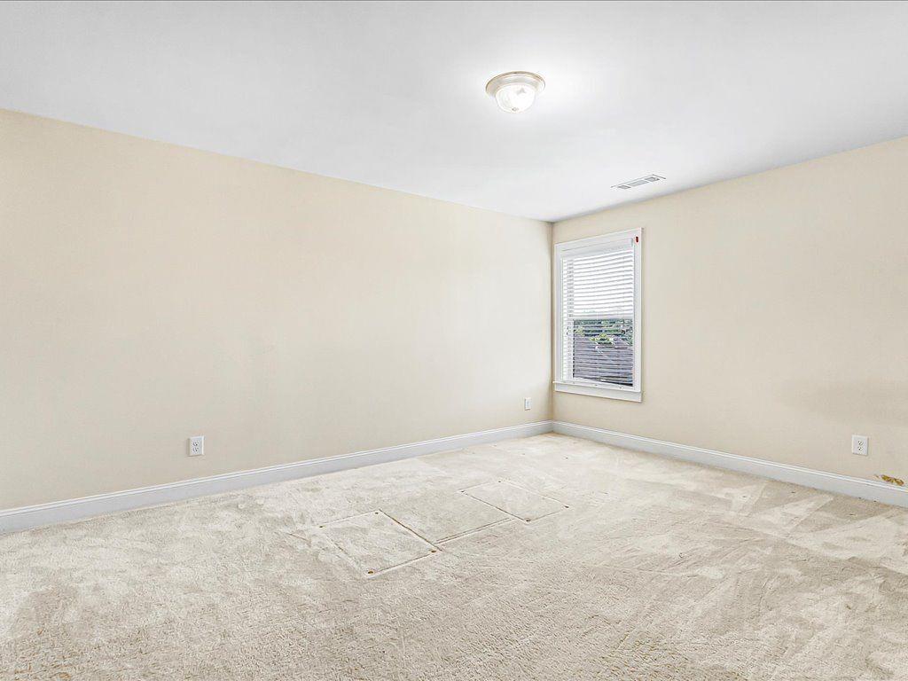 80 Lanier Ridge Acworth, GA 30101 - Photo 55 of 59 an empty room with a empty space and a window