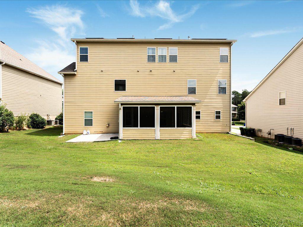 80 Lanier Ridge Acworth, GA 30101 - Photo 57 of 59 a front view of a house with a yard