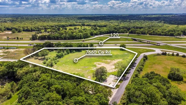 a view of a swimming pool and a yard