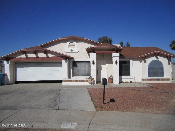 6932 West Merrell Street Phoenix, AZ 85033 - Photo 1 of 9 FRONT