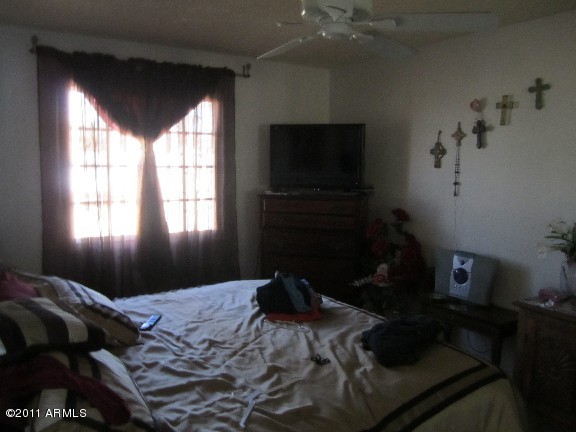 6932 West Merrell Street Phoenix, AZ 85033 - Photo 6 of 9 MASTER BEDROOM