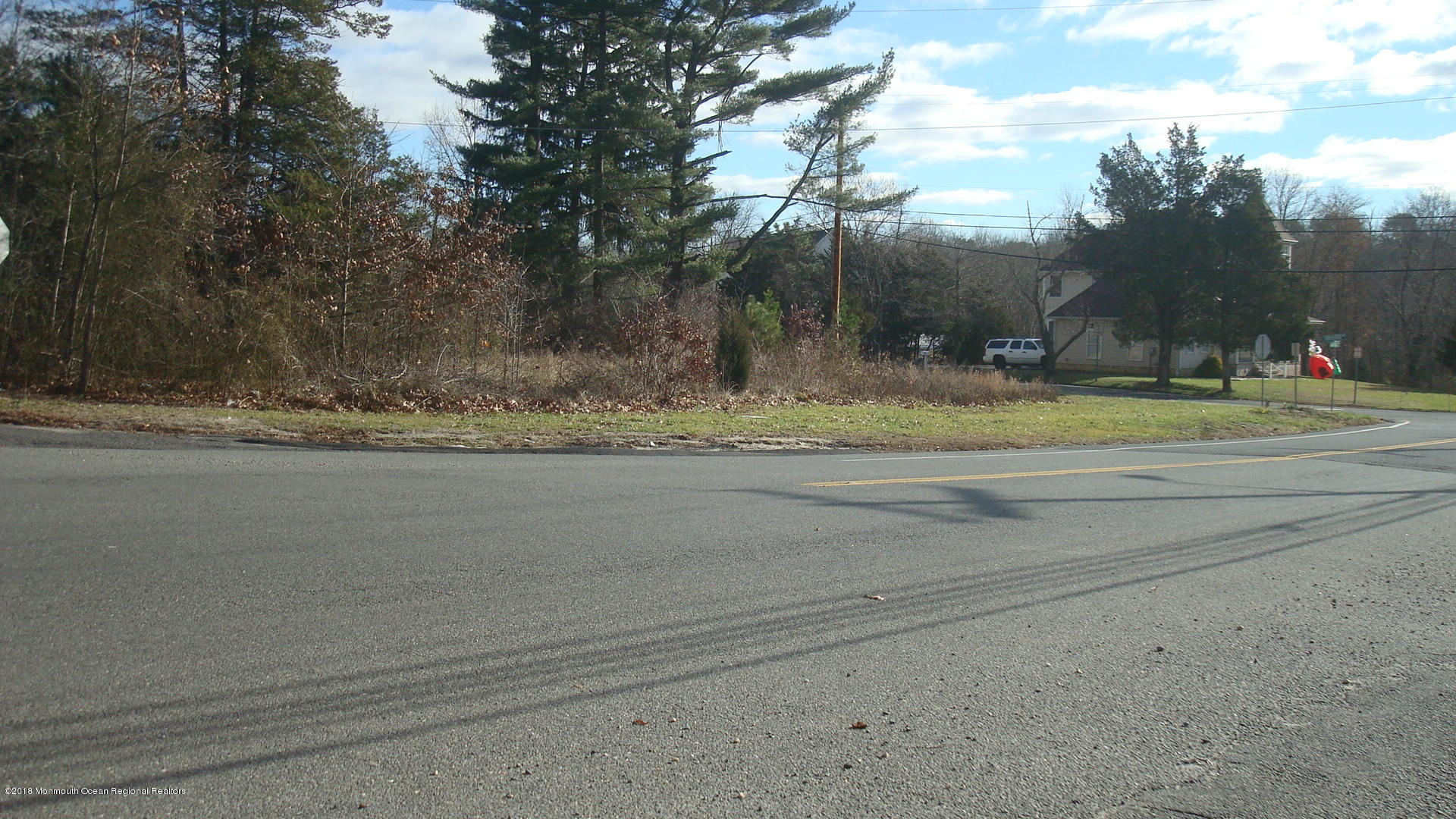 266 Thompson Bridge Road Jackson, NJ 08527 - Photo 1 of 4 a small yard with large trees