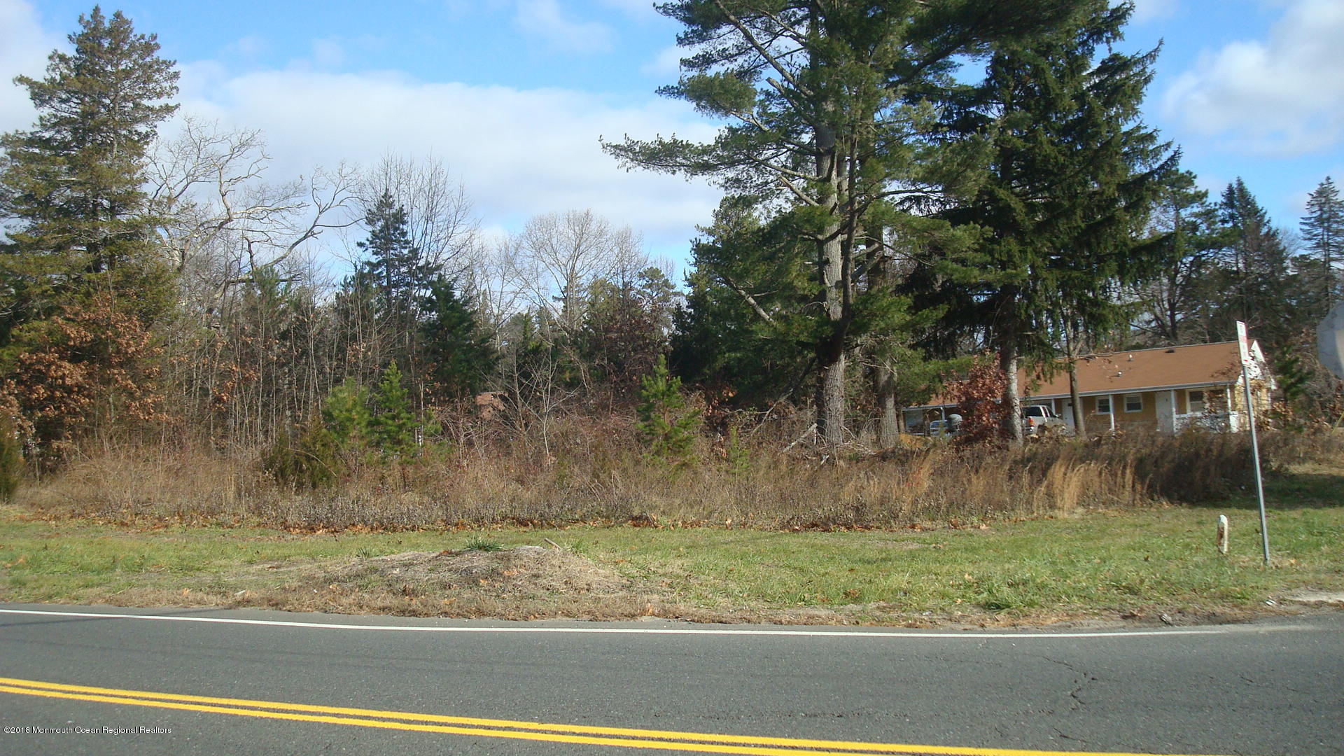 266 Thompson Bridge Road Jackson, NJ 08527 - Photo 3 of 4 a view of a yard and a house