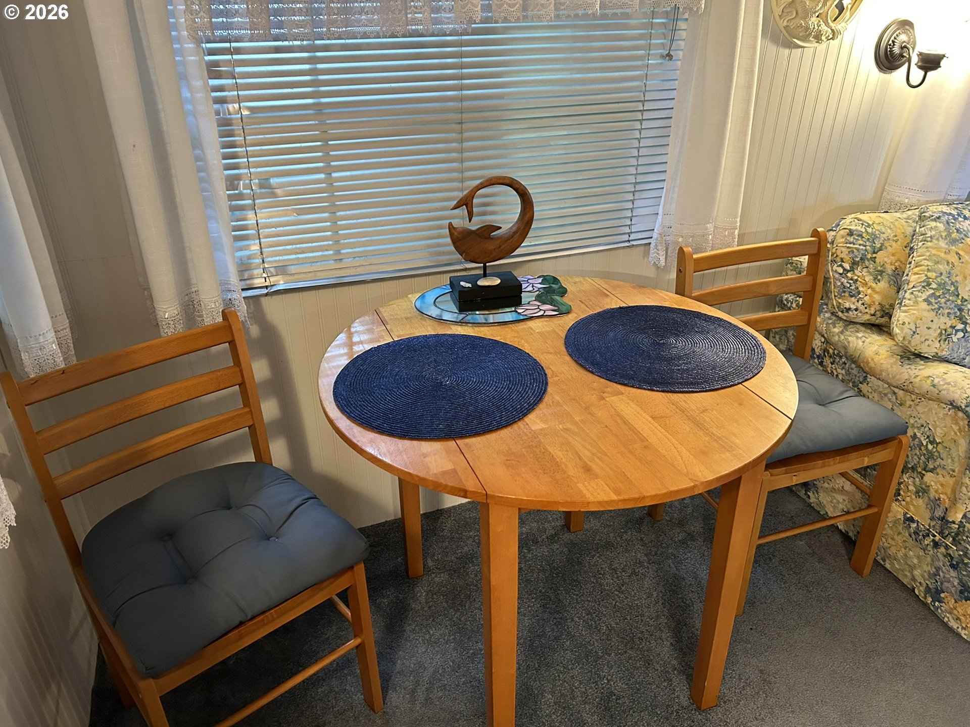 112 Sailor Lane Florence, OR 97439 - Photo 14 of 44 a view of a dining room with furniture and wooden floor