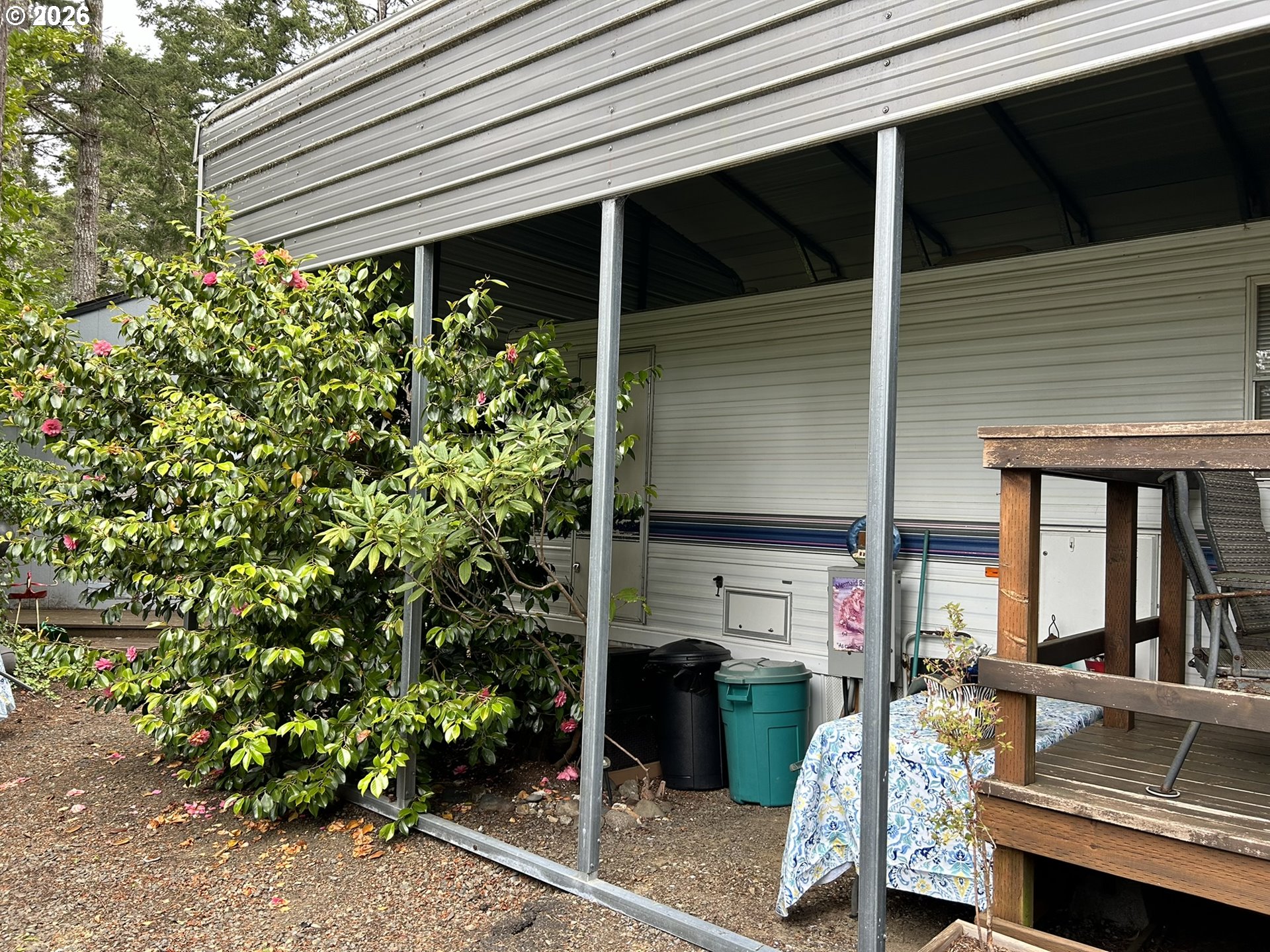 112 Sailor Lane Florence, OR 97439 - Photo 5 of 44 a room that has a bed and a window