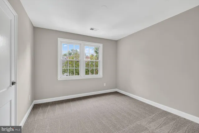 an empty room with a window